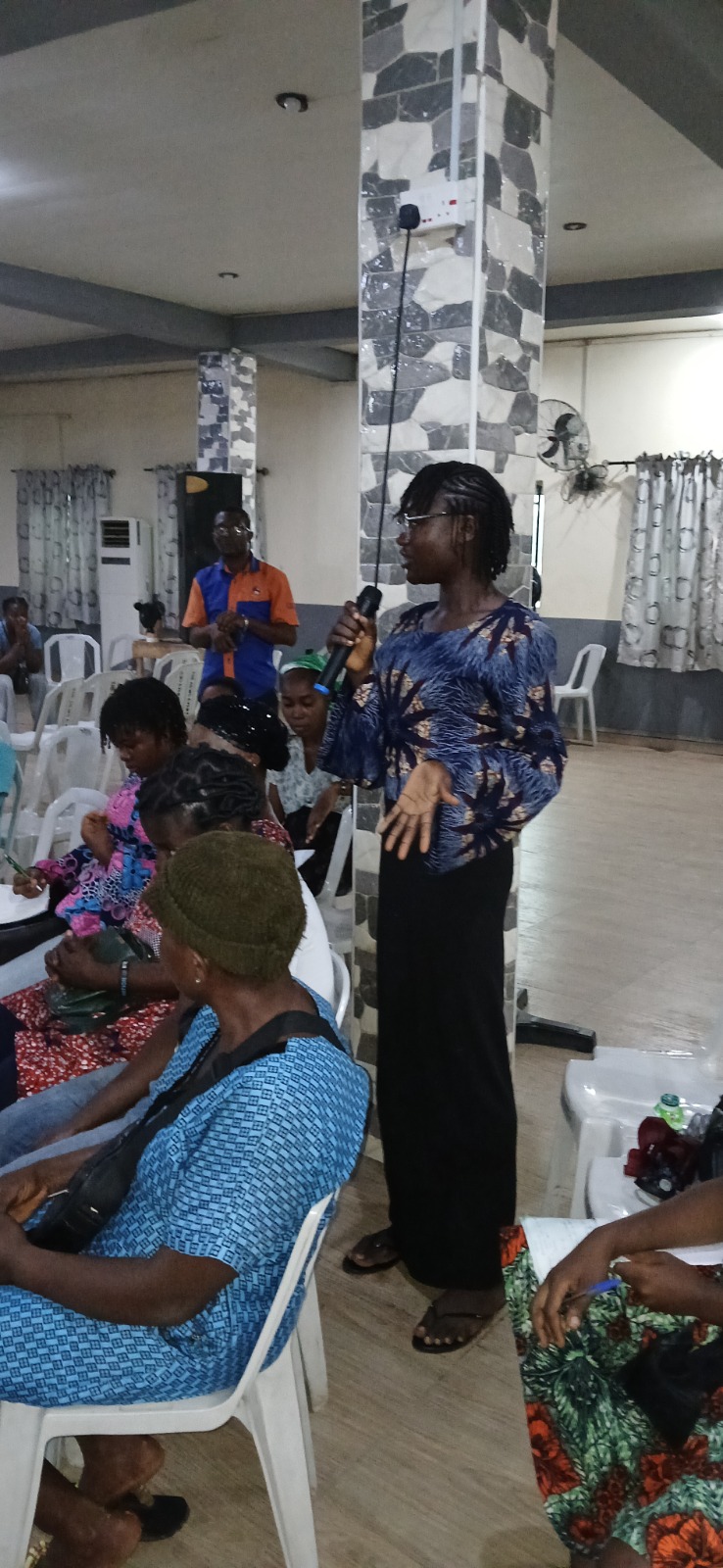 A facilitator guiding participants through a practical lesson